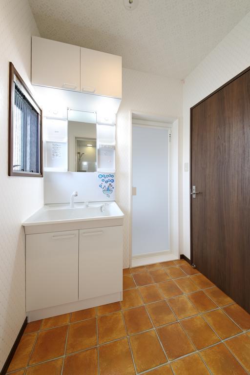 Guesthouse Tiga Kumamoto Habitación foto
